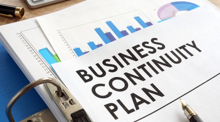 business continuity plan sitting on top of stack of graphs