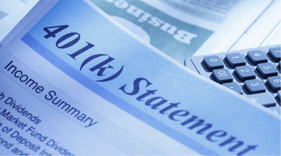 401(k) statement with a calculator in the backgroun